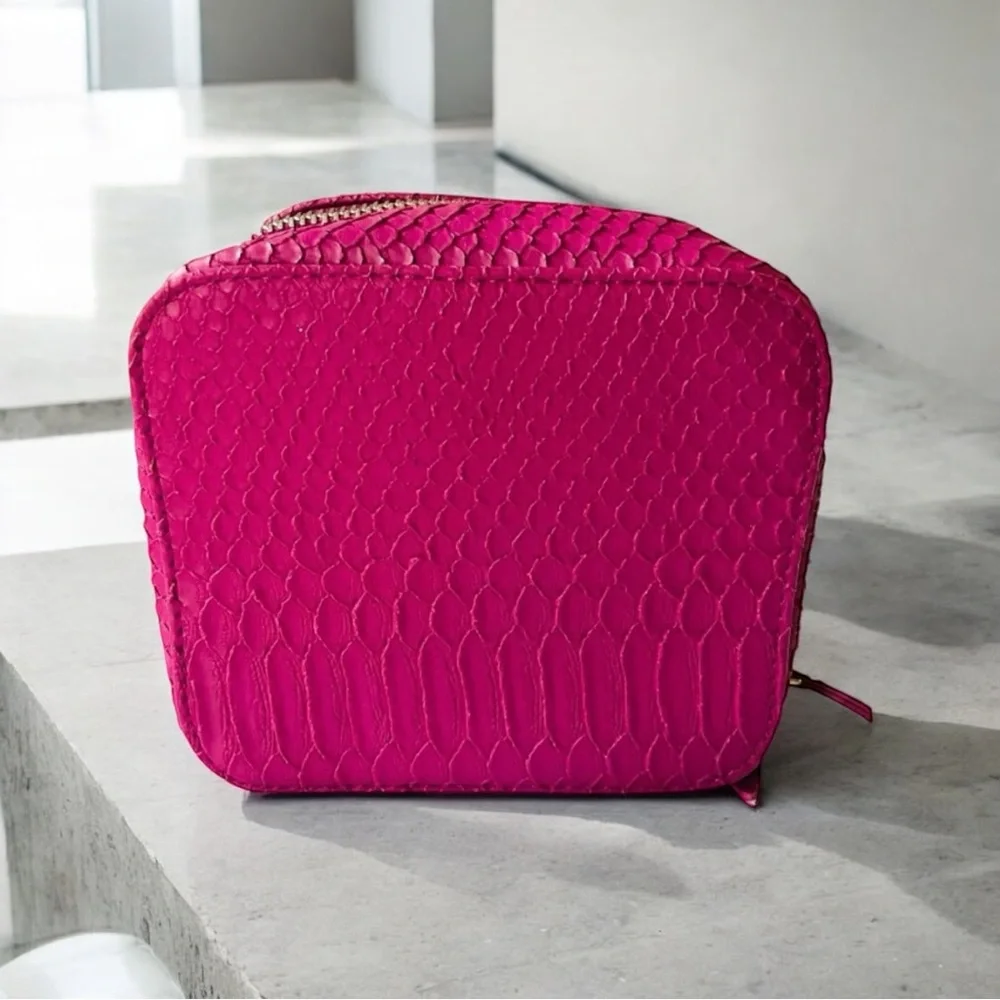TRISH McEvoy embossed pink makeup planner